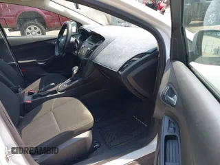 2016 Ford Focus SE z VIN 1FADP3F24GL268619, wystawiony jako IAAI lot #42750298 z przebiegiem 96 587 mil mil oraz . Historia ofert i sprzedaży dostępna na DreamBid. Obrazek 5.