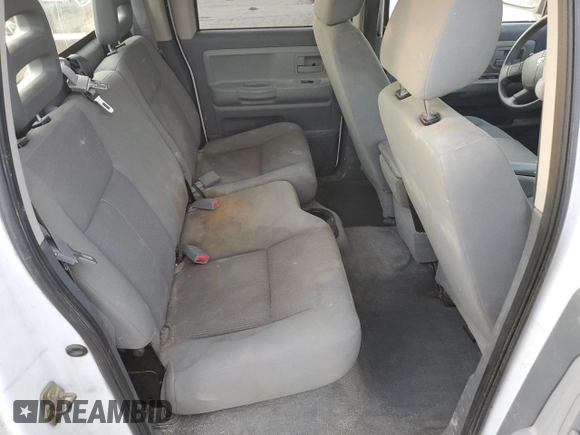 2006 Dodge Dakota SLT with VIN 1D7HE48K46S521050, listed as a Copart auction lot 87286144 with 252,799 mi miles and Salvage Title. Bid and sale history available at DreamBid. Image 10.