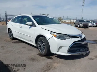 2016 Toyota Avalon Hybrid XLE Premium with VIN 4T1BD1EB8GU056490, listed as a IAAI auction lot 41548030 with 143,946 mi miles. Bid and sale history available at carsss.com. Image 1.