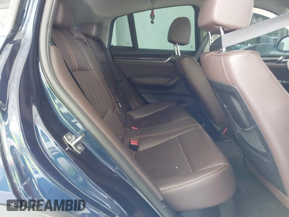 2015 BMW X4 xDrive28i with VIN 5UXXW3C51F0M87268, listed as a IAAI auction lot 42366363 with 143,285 mi miles and . Bid and sale history available at DreamBid. Image 8.