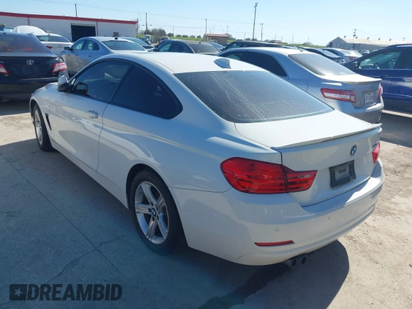 2014 BMW 4 Series 428i xDrive with VIN WBA3N9C58EF721369, listed as a IAAI auction lot 41768891 with 181,068 mi miles and . Bid and sale history available at DreamBid. Image 3.