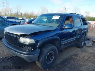 2002 Chevrolet Tahoe LT with VIN 1GNEK13Z42J140816, listed as a IAAI auction lot 41973686 with 241,722 mi miles. Bid and sale history available at carsss.com. Image 20.