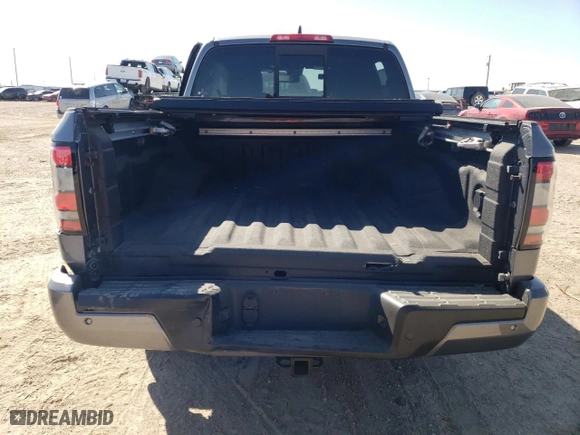 2022 Nissan Frontier PRO-X with VIN 1N6ED1EJ4NN687038, listed as a Copart auction lot 74777834 with 2,180 mi miles and Salvage Title. Bid and sale history available at carsss.com. Image 6.