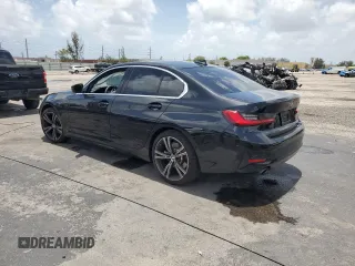 2021 BMW 3 Series 330i with VIN 3MW5R1J0XM8C21971, listed as a Copart auction lot 60659725 with 36,023 mi miles and Salvage title. Bid and sale history available at DreamBid. Image 2.