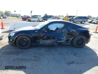 2014 Scion FR-S z VIN JF1ZNAA11E8702526, wystawiony jako IAAI lot #42068499 z przebiegiem 79 312 mil mil oraz . Historia ofert i sprzedaży dostępna na DreamBid. Obrazek 13.