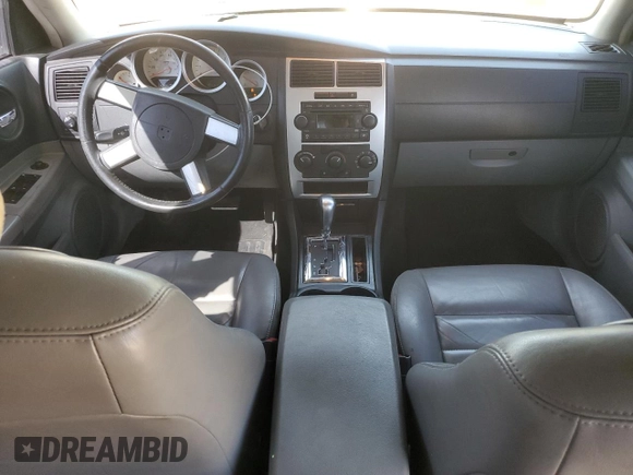 2006 Dodge Charger with VIN 2B3KA43G56H390329, listed as a Copart auction lot 46658235 with 252,522 mi miles and Salvage Title. Bid and sale history available at DreamBid. Image 8.