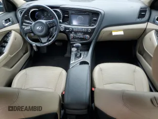 2014 Kia Optima EX with VIN KNAGN4AD0E5068864, listed as a Copart auction lot 64991005 with 125,108 mi miles and Salvage title. Bid and sale history available at DreamBid. Image 8.