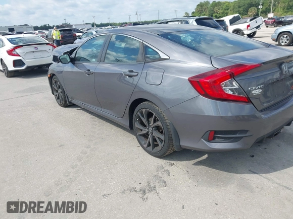 2019 Honda Civic Sedan Sport with VIN 19XFC2F8XKE035939, listed as a IAAI auction lot 42032928 with 84,414 mi miles. Bid and sale history available at carsss.com. Image 3.