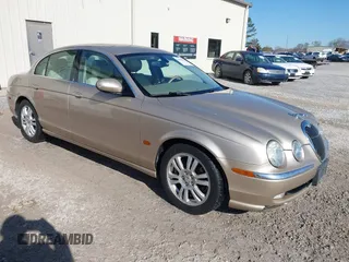 2003 Jaguar S-Type with VIN SAJEA01UX3HM79166, listed as a IAAI auction lot 41886904 with 147,634 mi miles and . Bid and sale history available at DreamBid. Image 1.