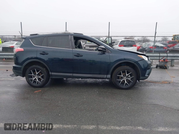 2017 Toyota RAV4 SE with VIN 2T3NFREV3HW372775, listed as a IAAI auction lot 41571705 with 119,015 mi miles and . Bid and sale history available at DreamBid. Image 12.