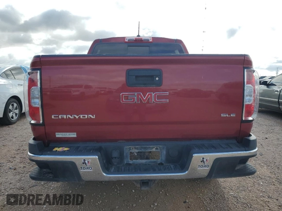 2016 GMC Canyon 4WD SLE with VIN 1GTG6CE32G1262835, listed as a Copart auction lot 55734815 with 67,874 mi miles and Salvage title. Bid and sale history available at DreamBid. Image 6.