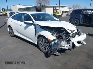 2018 Honda Civic EX with VIN 2HGFC2F71JH502564, listed as a IAAI auction lot 41933157 with 56,696 mi miles and . Bid and sale history available at DreamBid. Image 1.