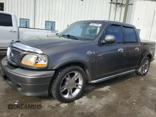 2002 Ford F-150 Harley Davidson with VIN 1FTRW07352KD72978, listed as a Copart auction lot 85037204 with 53,951 mi miles and Salvage Title. Bid and sale history available at carsss.com. Image 1.
