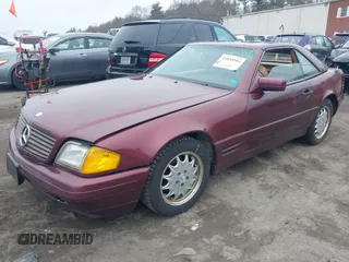 1997 Mercedes-Benz SL-Class with VIN WDBFA67F3VF142320, listed as a IAAI auction lot 41835593 with 172,151 mi miles. Bid and sale history available at carsss.com. Image 2.