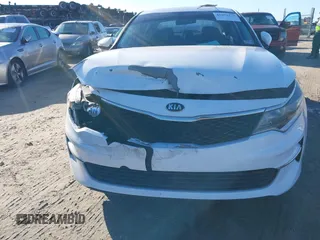 2016 Kia Optima LX with VIN 5XXGT4L36GG005859, listed as a IAAI auction lot 41053277 with 127,783 mi miles. Bid and sale history available at carsss.com. Image 6.