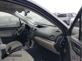 2014 Subaru Forester 2.5i Touring with VIN JF2SJAPC2EH552590, listed as a IAAI auction lot 41490583 with 84,538 mi miles. Bid and sale history available at carsss.com. Image 5.