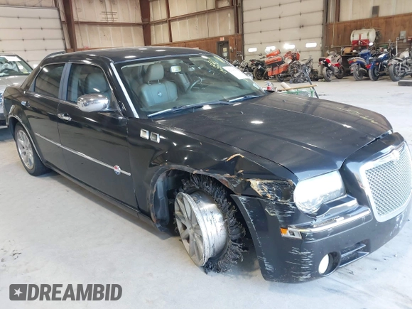 2006 Chrysler 300 C with VIN 2C3KA63H06H421414, listed as a IAAI auction lot 42144274 with 118,692 mi miles. Bid and sale history available at carsss.com. Image 13.