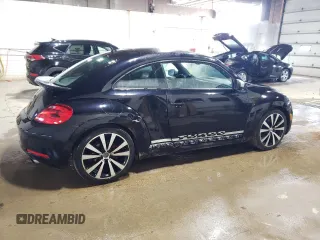 2012 Volkswagen Beetle 2.0T Turbo w/Sun/Snd/Nav PZEV with VIN 3VWVA7AT9CM604665, listed as a Copart auction lot 51984735 with 111,938 mi miles and Clean Title. Bid and sale history available at carsss.com. Image 4.