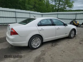 2012 Ford Fusion Hybrid with VIN 3FADP0L34CR414234, listed as a Copart auction lot 58891715 with 147,409 mi miles and Salvage title. Bid and sale history available at DreamBid. Image 3.