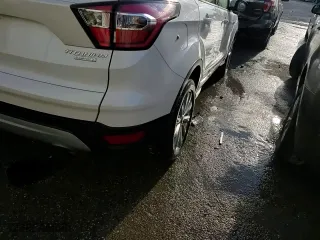 2017 Ford Escape Titanium with VIN 1FMCU0JD9HUB48912, listed as a Copart auction lot 84016554 with 52,199 mi miles and Salvage Title. Bid and sale history available at carsss.com. Image 14.