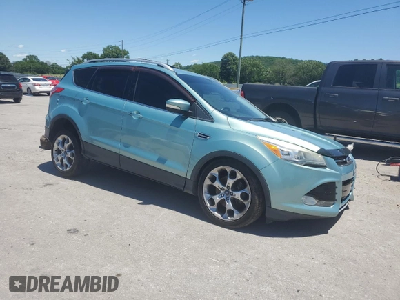 2013 Ford Escape Titanium с VIN 1FMCU0J98DUB77372, выставлен на аукционе Copart как лот 58006235 с пробегом 200 929 миль миль и Списание • Salvage title. История ставок и продаж доступна на DreamBid. Изображение 4.