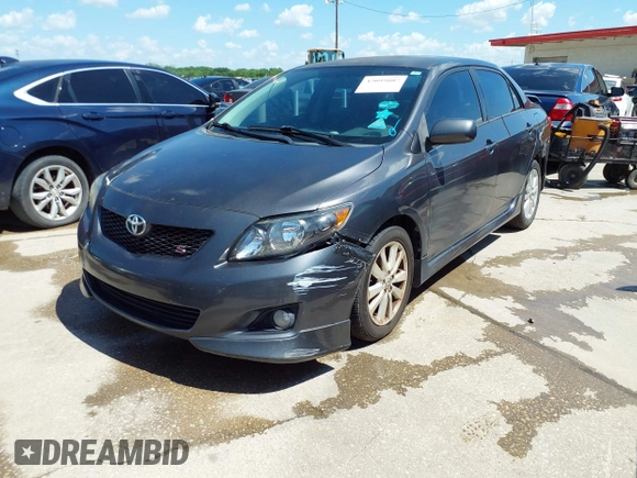2010 Toyota Corolla with VIN 2T1BU4EEXAC463697, listed as a IAAI auction lot 42099807 with 206,160 mi miles. Bid and sale history available at carsss.com. Image 2.