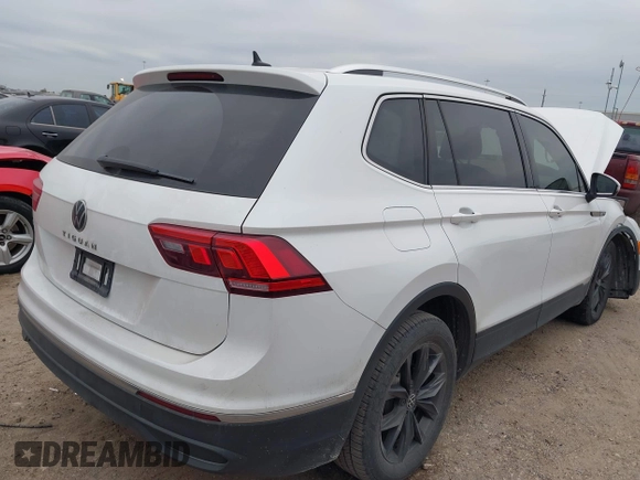 2023 Volkswagen Tiguan SE with VIN 3VVNB7AX8PM099759, listed as a IAAI auction lot 41340885 with 28,562 mi miles and . Bid and sale history available at DreamBid. Image 4.