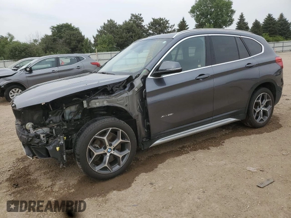 2017 BMW X1 xDrive28i with VIN WBXHT3Z3XH4A53999, listed as a Copart auction lot 60500265 with 43,377 mi miles and Salvage title. Bid and sale history available at DreamBid. Image 1.