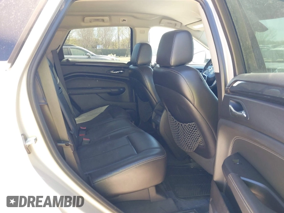 2013 Cadillac SRX z VIN 3GYFNAE33DS654844, wystawiony jako IAAI lot #41765013 z przebiegiem 117 616 mil mil oraz . Historia ofert i sprzedaży dostępna na DreamBid. Obrazek 8.
