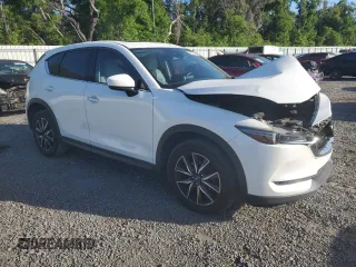 2017 Mazda CX-5 Grand Touring with VIN JM3KFADL1H0141132, listed as a Copart auction lot 51755095 with 116,220 mi miles and Salvage Title. Bid and sale history available at carsss.com. Image 4.