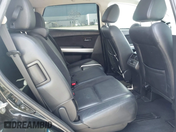 2015 Mazda CX-9 Grand Touring z VIN JM3TB2DA4F0450014, wystawiony jako IAAI lot #41692935 z przebiegiem 90 800 mil mil oraz . Historia ofert i sprzedaży dostępna na DreamBid. Obrazek 8.
