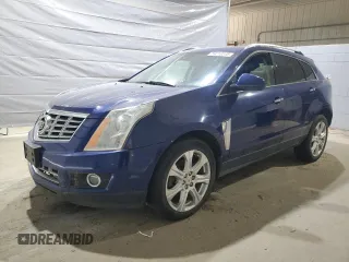 2013 Cadillac SRX Performance Collection z VIN 3GYFNHE30DS594594, wystawiony jako Copart lot #59213285 z przebiegiem Nie podano mil oraz Czysty tytuł • Clean title. Historia ofert i sprzedaży dostępna na DreamBid. Obrazek 1.