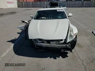 2014 Nissan 370Z Nismo with VIN JN1AZ4EH2EM633022, listed as a Copart auction lot 46947575 with 115,042 mi miles and Salvage Title. Bid and sale history available at DreamBid. Image 11.