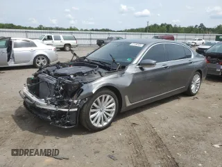 2018 BMW 7 Series 740i xDrive with VIN WBA7E4C54JGV24207, listed as a Copart auction lot 61136305 with 62,071 mi miles and Salvage title. Bid and sale history available at DreamBid. Image 1.