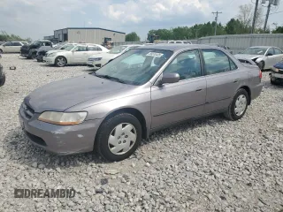 2000 Honda Accord LX z VIN 1HGCG1648YA051066, wystawiony jako Copart lot #56510435 z przebiegiem 149 284 mil mil oraz Czysty tytuł • Clean title. Historia ofert i sprzedaży dostępna na DreamBid. Obrazek 1.