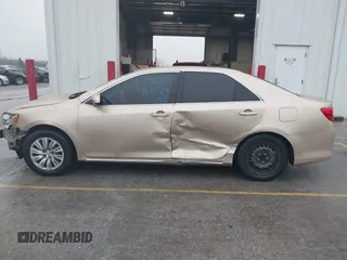 2012 Toyota Camry L with VIN 4T4BF1FK9CR164657, listed as a IAAI auction lot 40900844 with 113,666 mi miles and . Bid and sale history available at DreamBid. Image 15.