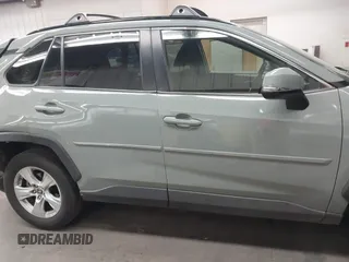 2019 Toyota RAV4 XLE with VIN JTMP1RFV2KD028137, listed as a IAAI auction lot 41931454 with 88,998 mi miles and . Bid and sale history available at DreamBid. Image 13.