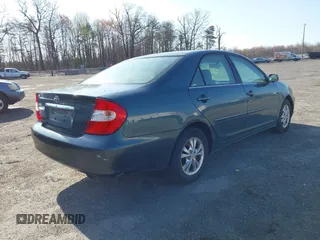 2004 Toyota Camry LE with VIN 4T1BF32K04U074276, listed as a IAAI auction lot 41940050 with 266,420 mi miles and . Bid and sale history available at DreamBid. Image 4.