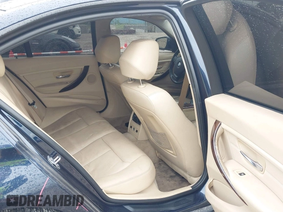 2013 BMW 3 Series 328i xDrive with VIN WBA3B3C50DJ698249, listed as a IAAI auction lot 42303923 with 130,527 mi miles and . Bid and sale history available at DreamBid. Image 8.