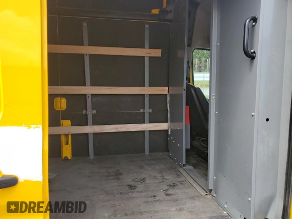 2022 Ford Transit Cargo z VIN 1FTBR1X85NKA42773, wystawiony jako Copart lot #57188295 z przebiegiem 59 108 mil mil oraz Szkody całkowita. Historia ofert i sprzedaży dostępna na DreamBid. Obrazek 11.