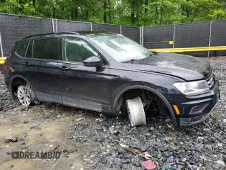 2019 Volkswagen Tiguan S with VIN 3VV0B7AX7KM067047, listed as a Copart auction lot 55693685 with 141,069 mi miles and Salvage title. Bid and sale history available at DreamBid. Image 4.
