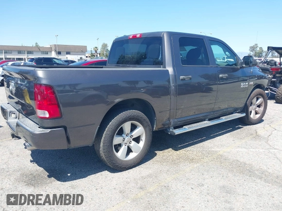 2014 Ram 1500 Express with VIN 1C6RR6KTXES333106, listed as a IAAI auction lot 42220459 with 171,699 mi miles and . Bid and sale history available at DreamBid. Image 4.