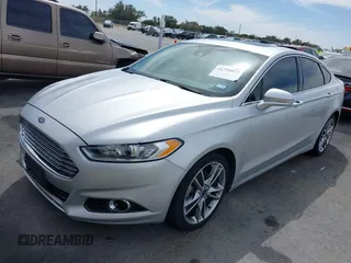 2016 Ford Fusion Titanium with VIN 3FA6P0K90GR132709, listed as a IAAI auction lot 41790873 with 63,269 mi miles and . Bid and sale history available at carsss.com. Image 18.