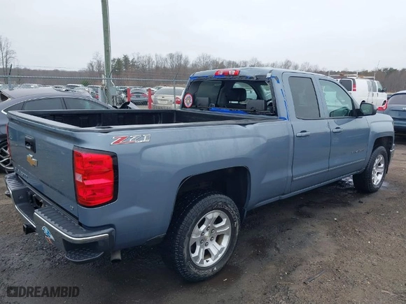 2015 Chevrolet Silverado 1500 LT with VIN 1GCVKREC1FZ330239, listed as a IAAI auction lot 41672993 with 87,766 mi miles. Bid and sale history available at carsss.com. Image 4.
