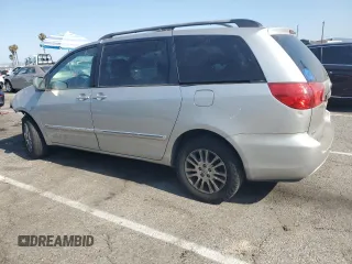 2010 Toyota Sienna XLE with VIN 5TDDK4CC8AS032007, listed as a Copart auction lot 65611495 with 299,904 mi miles and Salvage title. Bid and sale history available at DreamBid. Image 2.