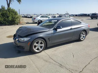 2014 BMW 4 Series 428i with VIN WBA3N7C5XEK220706, listed as a Copart auction lot 53860725 with 85,882 mi miles and Salvage title. Bid and sale history available at DreamBid. Image 1.