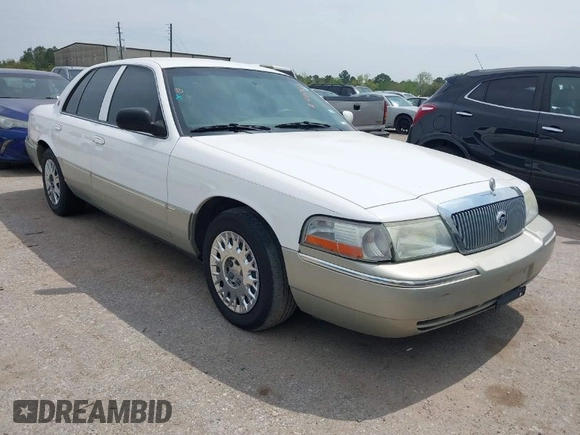 2004 Mercury Grand Marquis GS z VIN 2MEFM74W54X654116, wystawiony jako IAAI lot #41875021 z przebiegiem 129 999 mil mil oraz . Historia ofert i sprzedaży dostępna na DreamBid. Obrazek 1.