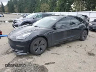 2023 Tesla Model 3 with VIN 5YJ3E1EA3PF644898, listed as a Copart auction lot 50427685 with 36,488 mi miles and Salvage Title. Bid and sale history available at DreamBid. Image 1.