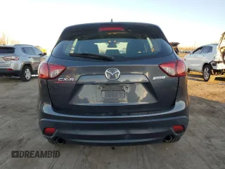 2016 Mazda CX-5 Sport with VIN JM3KE2BY9G0771969, listed as a Copart auction lot 80966064 with 99,348 mi miles and Salvage title. Bid and sale history available at DreamBid. Image 6.