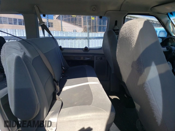2007 Ford Econoline Passenger XL with VIN 1FBSS31L77DB12766, listed as a Copart auction lot 72954844 with 149,562 mi miles and Salvage title. Bid and sale history available at DreamBid. Image 11.